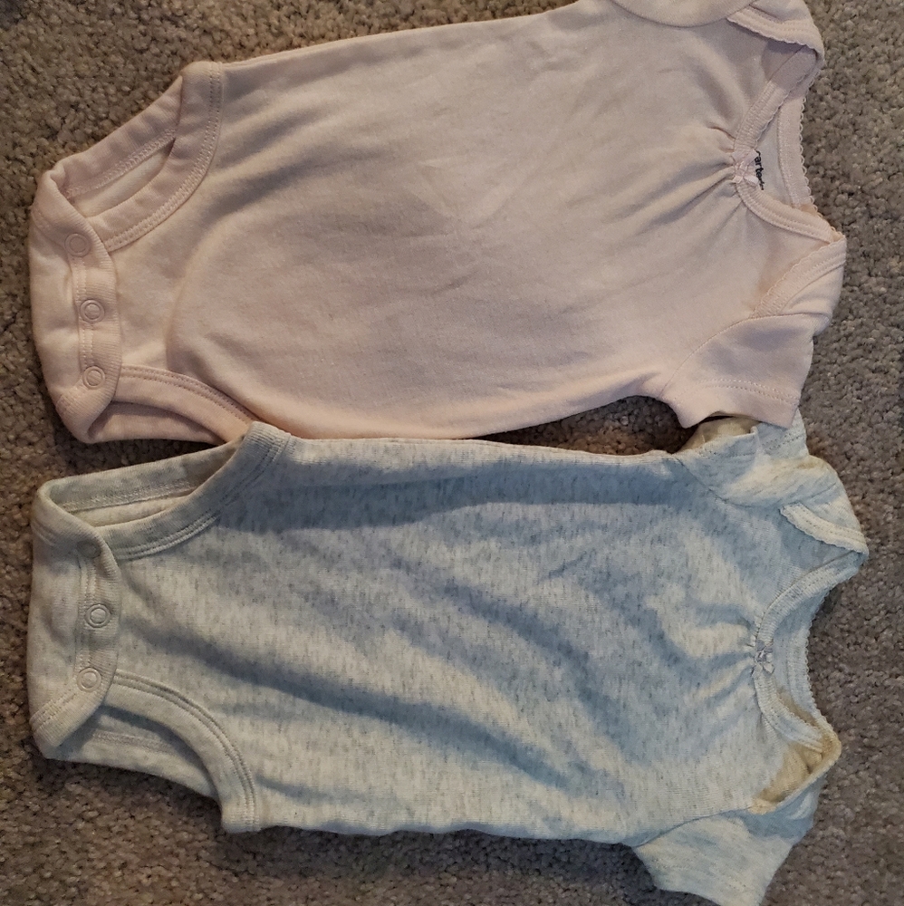 Never worn two carter's onesies